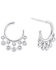Aretes arco con zirconias colgantes plata .925