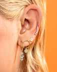 Aretes curvos con zirconias colgantes plata .925