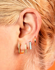 Arracada hexagonal con zirconias plata .925