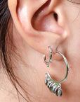 ARETE CURVO CON OVALOS COLGANTES