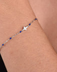 PULSERA CRUZ CZ CON CHAKIRA AZUL MARINO